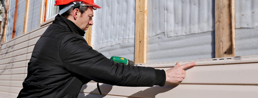 Vinyl siding installation.
