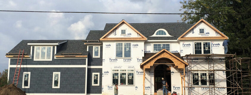 Vinyl shake siding installation.