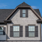 Home with possible vinyl shake siding issues.